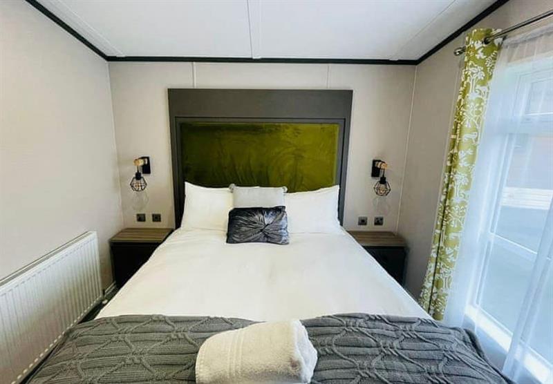 Bedroom in the Waterside Lodge VIP at Allerthorpe Golf and Country Park in Allerthorpe, Yorkshire