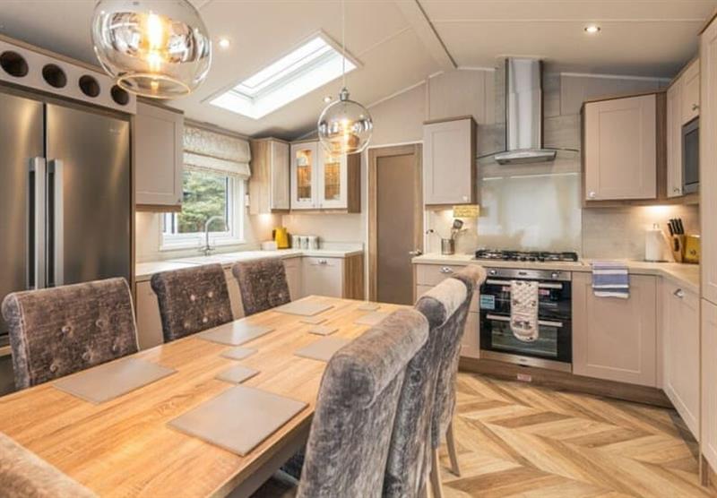 Dining area in the Water View Holiday Home VIP at Allerthorpe Golf and Country Park in Allerthorpe, Yorkshire