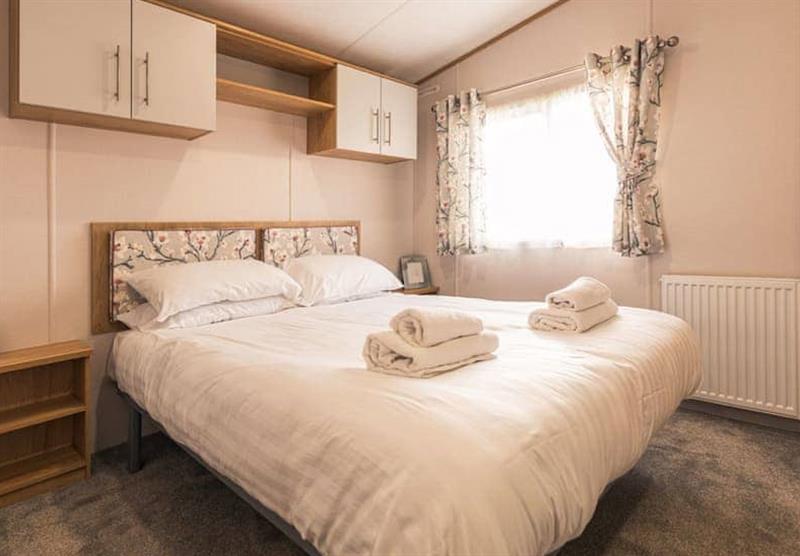 Double bedroom in the Lakeside Holiday Home VIP at Allerthorpe Golf and Country Park in Allerthorpe, Yorkshire