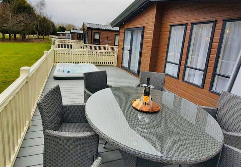 Hot tub and outdoor seating in the Lakeview Lodge VIP at Allerthorpe Golf and Country Park in Allerthorpe, Yorkshire