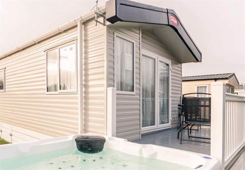 Hot tub outside the Lakeside Holiday Home VIP at Allerthorpe Golf and Country Park in Allerthorpe, Yorkshire