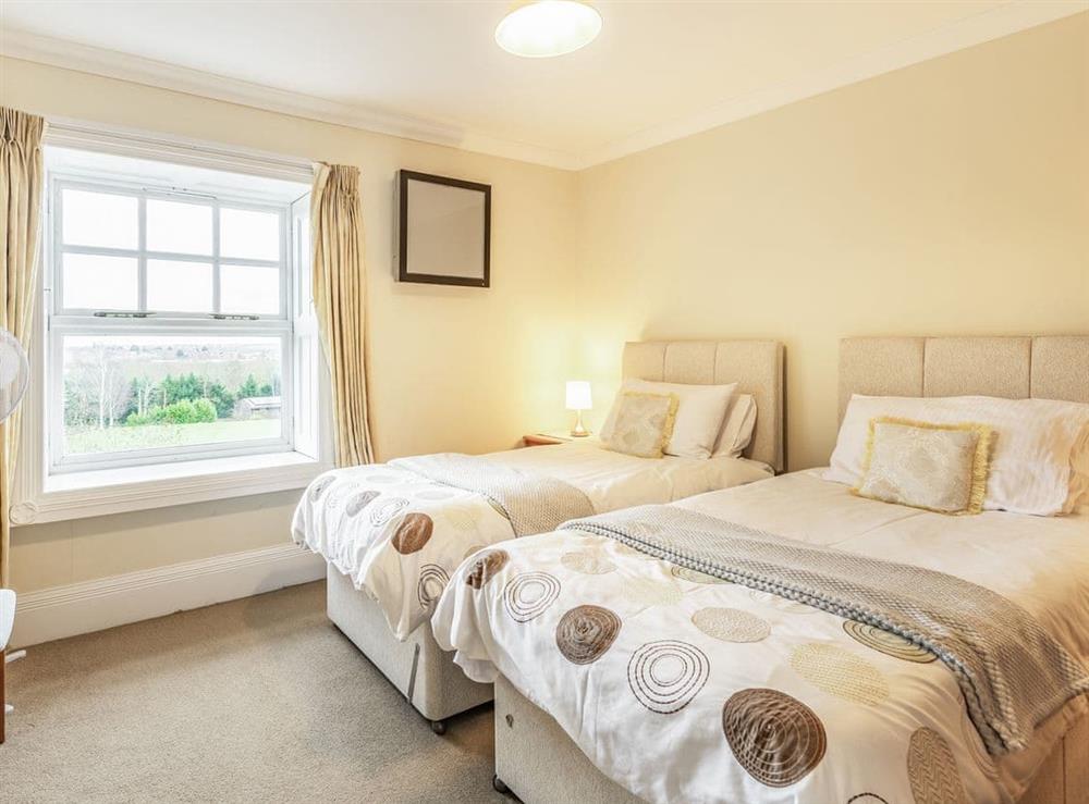 Superking or twin bedroom at Allerton House in Isham, Northamptonshire