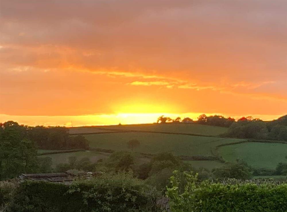 Sunsets from the courtyard garden at Alma Cottage in Axminster, Devon