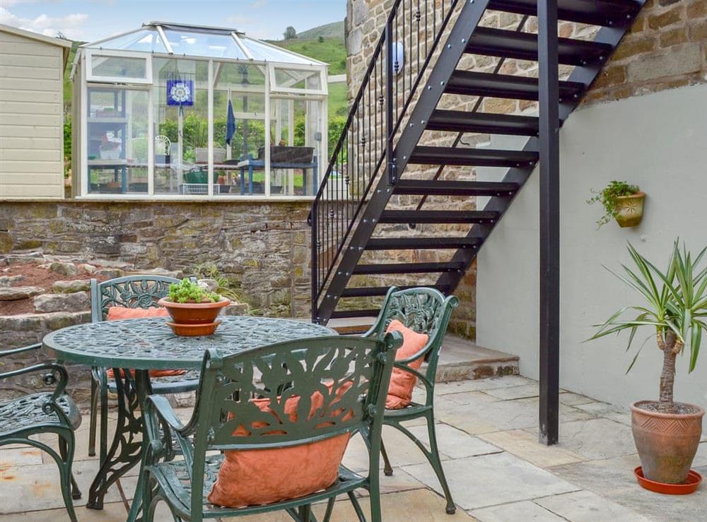 Spacious patio with sitting out area at Alphin Apartment in Mossley, Lancashire