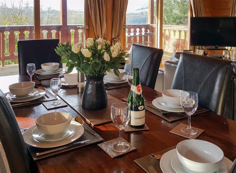 Charming dining area at Alpine Lodge in Kippford, near Dalbeattie, Kirkcudbrightshire