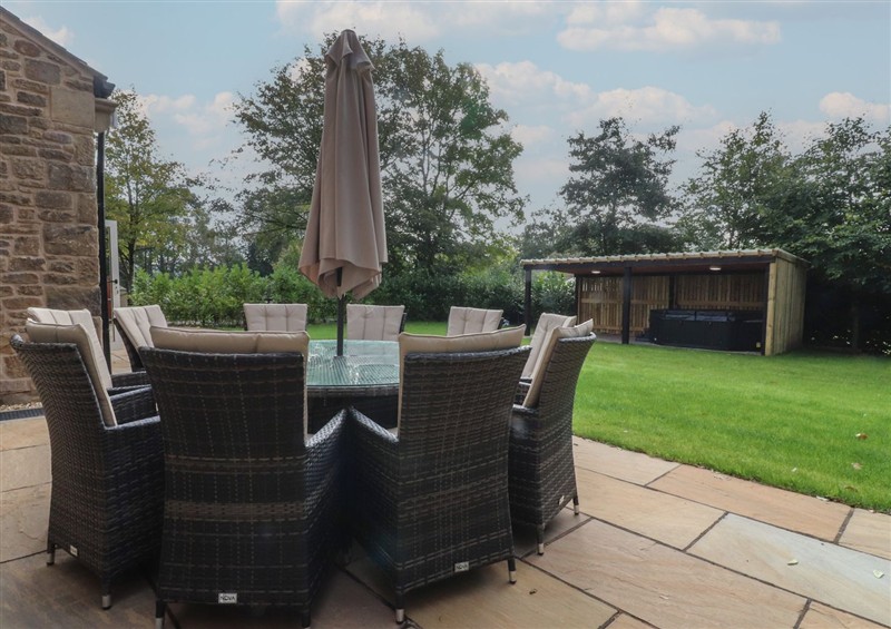 Enjoy a glass of wine on the patio at Alston House, Longridge
