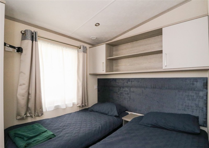 One of the bedrooms at Altair Lodge, St Fillans