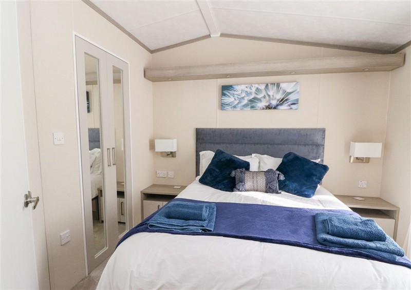 This is a bedroom at Altair Lodge, St Fillans