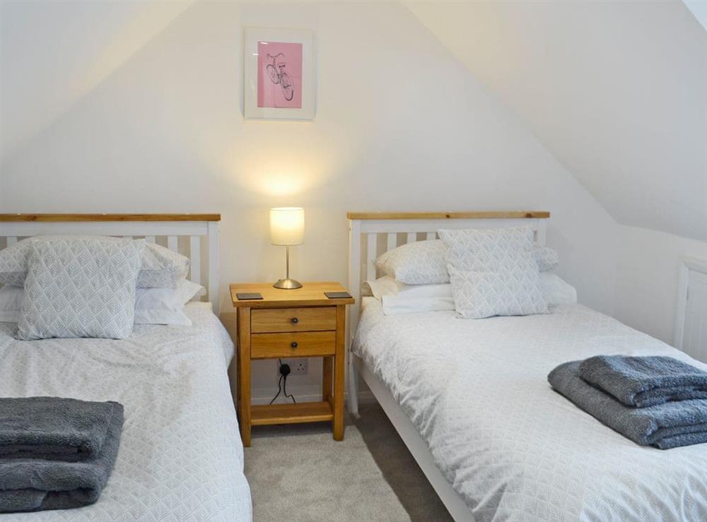 Charming twin bedroom at Altbeg in Isle of Arran, Scotland