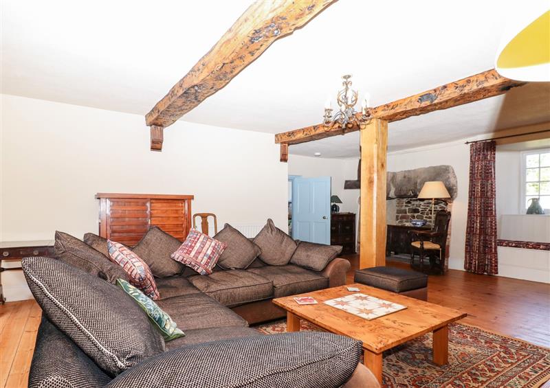 Relax in the living area at Alurics Hall, Porlock