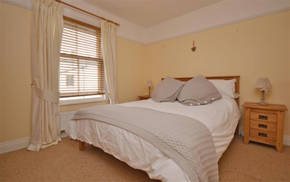 Master bedroom with en suite shower room at Alva in Brockenhurst