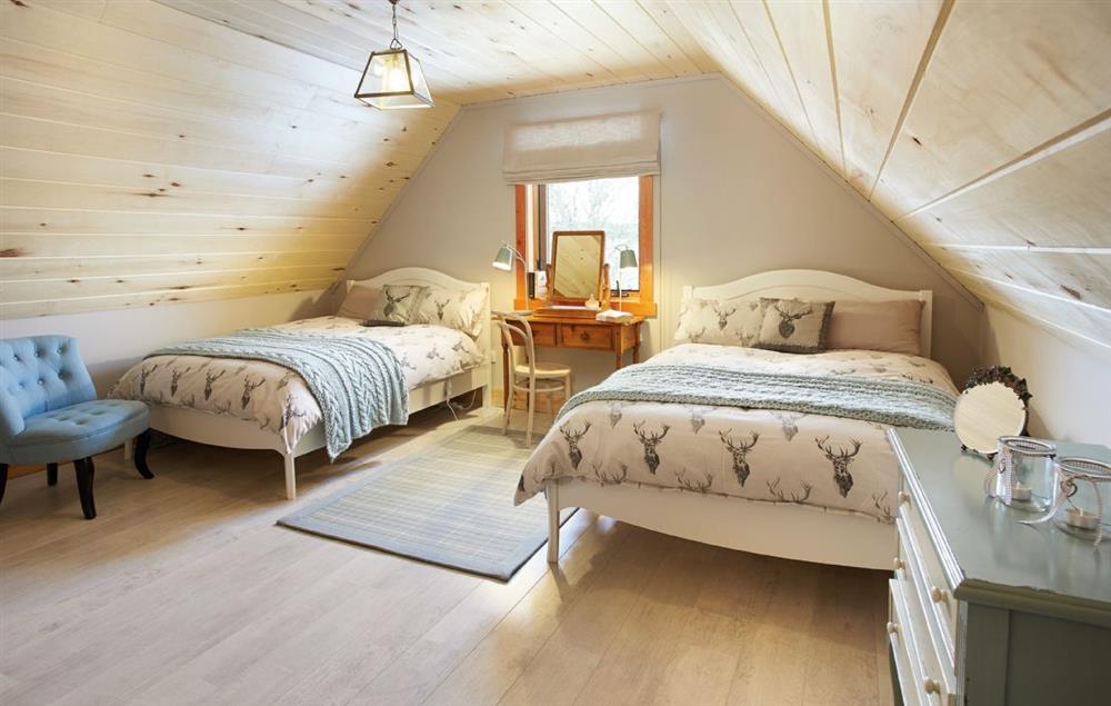 Double bedroom with two 4’6 beds at Am Bathach, Sutherland