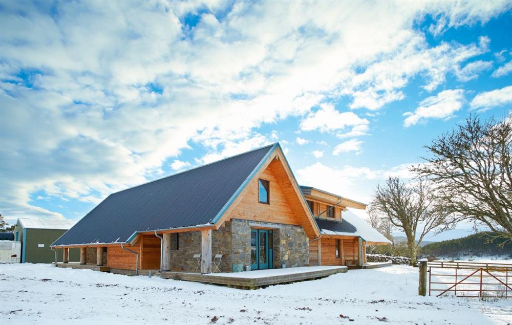 The property is surrounded by wild croft land and open skies at Am Bathach, Sutherland