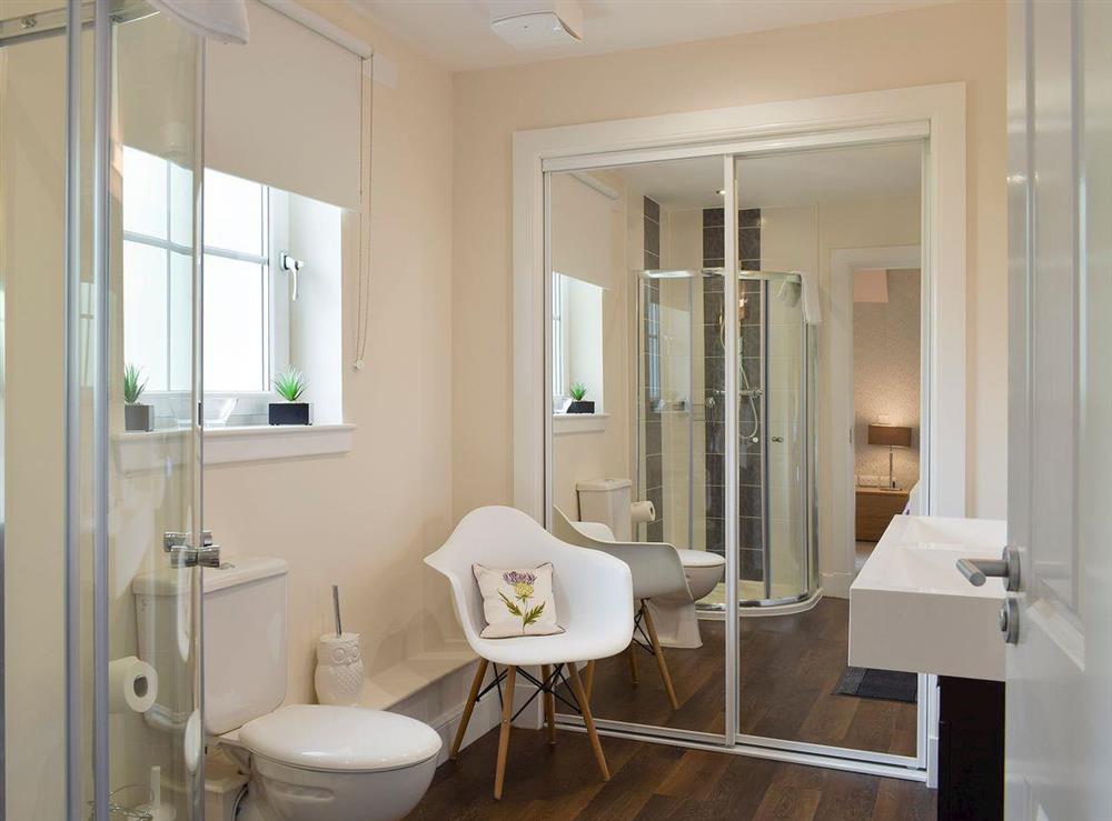 En-suite shower and dressing room at Am Tighndhuin in Killin, Perthshire