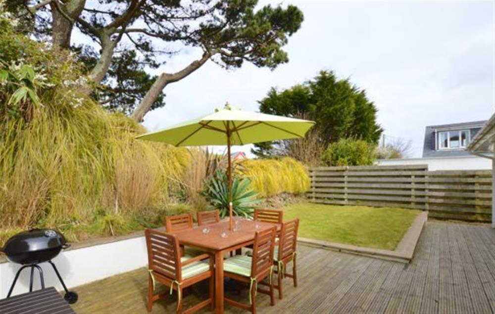 A spacious garden with decked area, garden furniture and barbecue (photo 2) at Amaroo, St Agnes