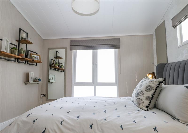 This is a bedroom at Amberwood 42, Milford On Sea