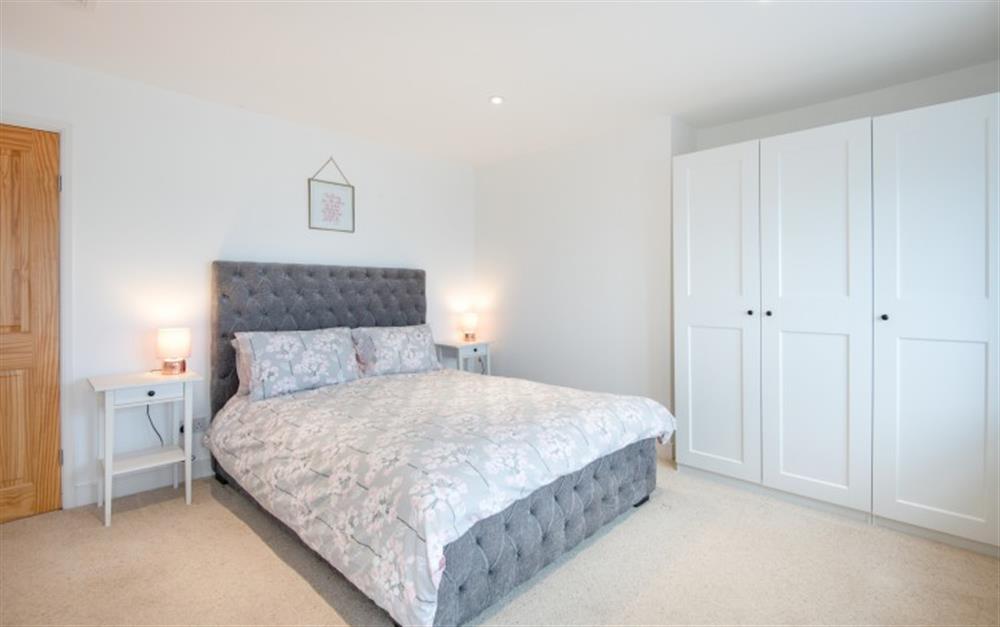 Comfortable, contemporary, light and bright master bedroom. at Anchor Cottage in Beesands