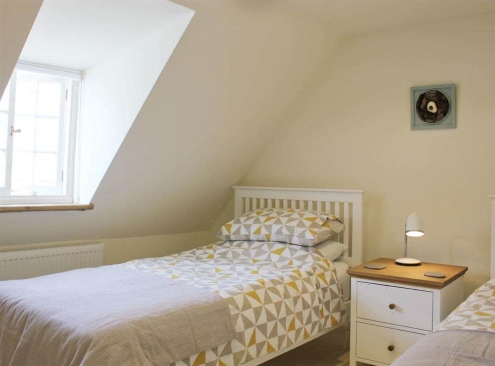 Modern comfortable twin bedroom at Anchor Cottage in Deal, Kent