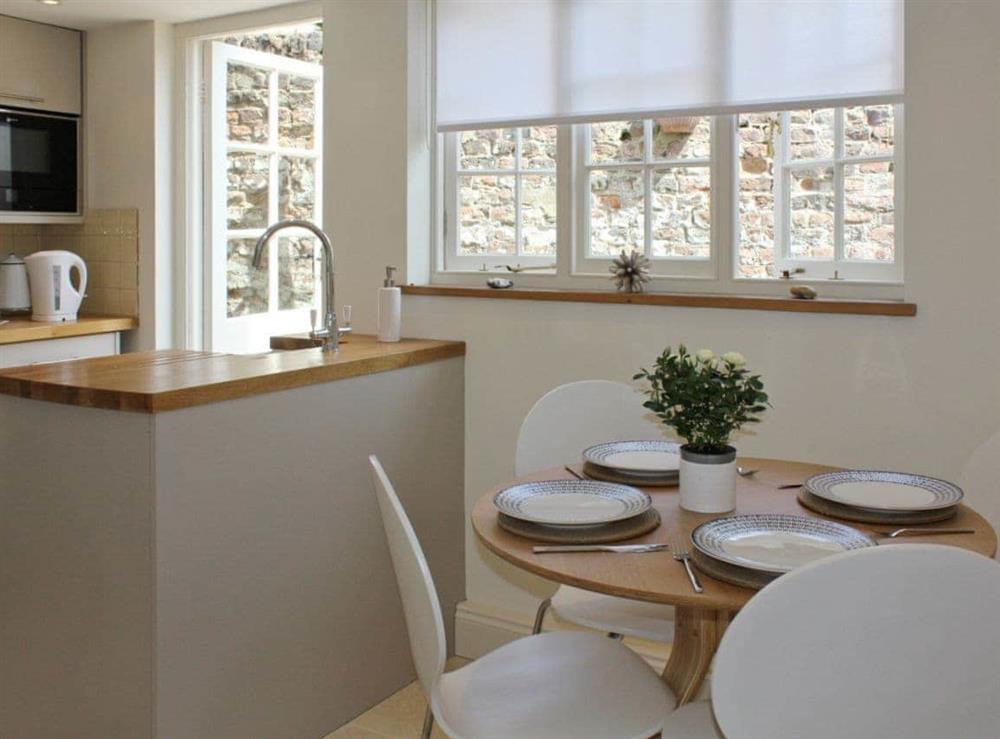 Open plan contemporary style kitchen & diner at Anchor Cottage in Deal, Kent