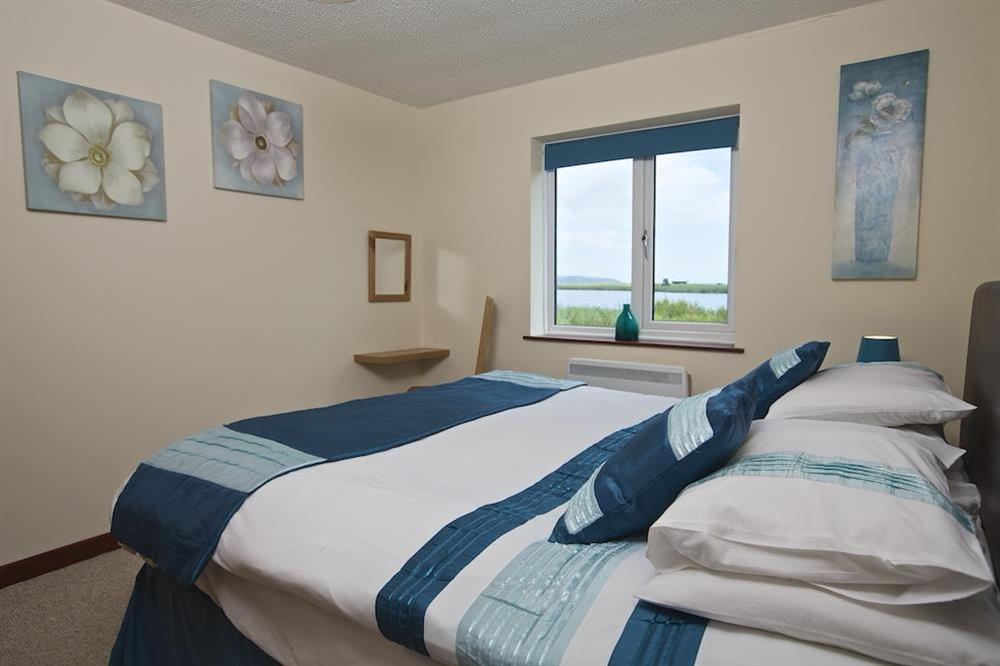 Master bedroom with super-King size bed at Anchor Ley in Torcross, Kingsbridge