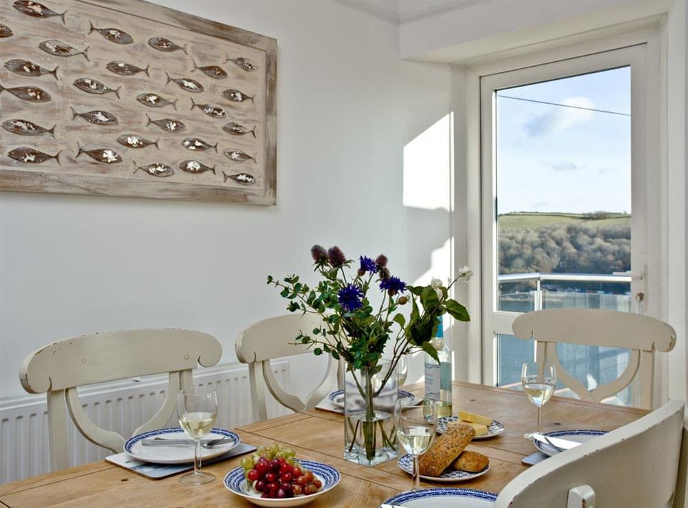 Dining area with amazing views overlooking the river at Anchor Loft in Fowey, Cornwall
