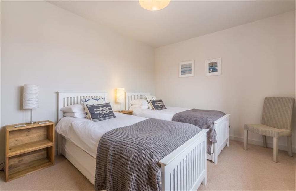 First floor: Bedroom four with full-size twin beds at Anchorage, Brancaster near Kings Lynn