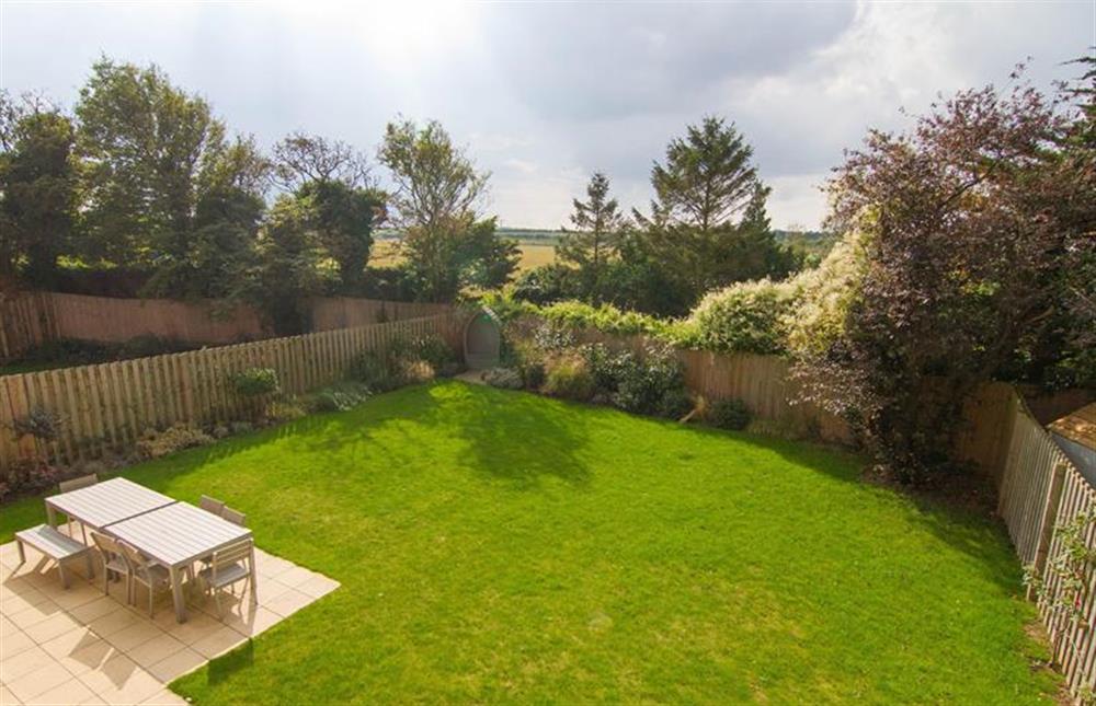 Fully enclosed rear garden mainly laid to lawn and views over countryside at Anchorage, Brancaster near Kings Lynn