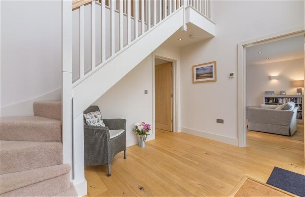 Ground floor: Entrance hall with stairs to first floor at Anchorage, Brancaster near Kings Lynn