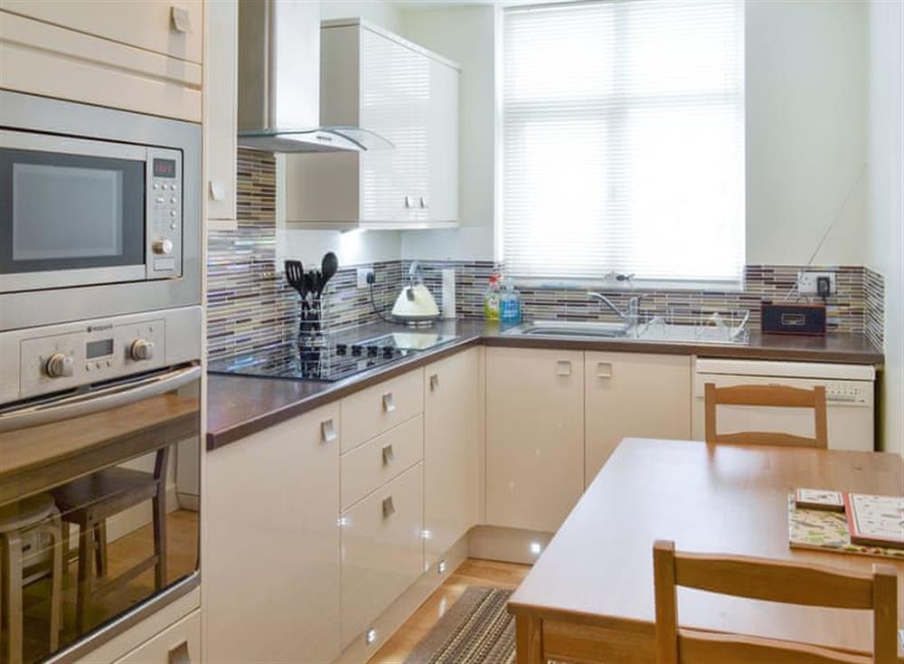 Fully appointed kitchen with dining area at Anchors Away in Filey, North Yorkshire