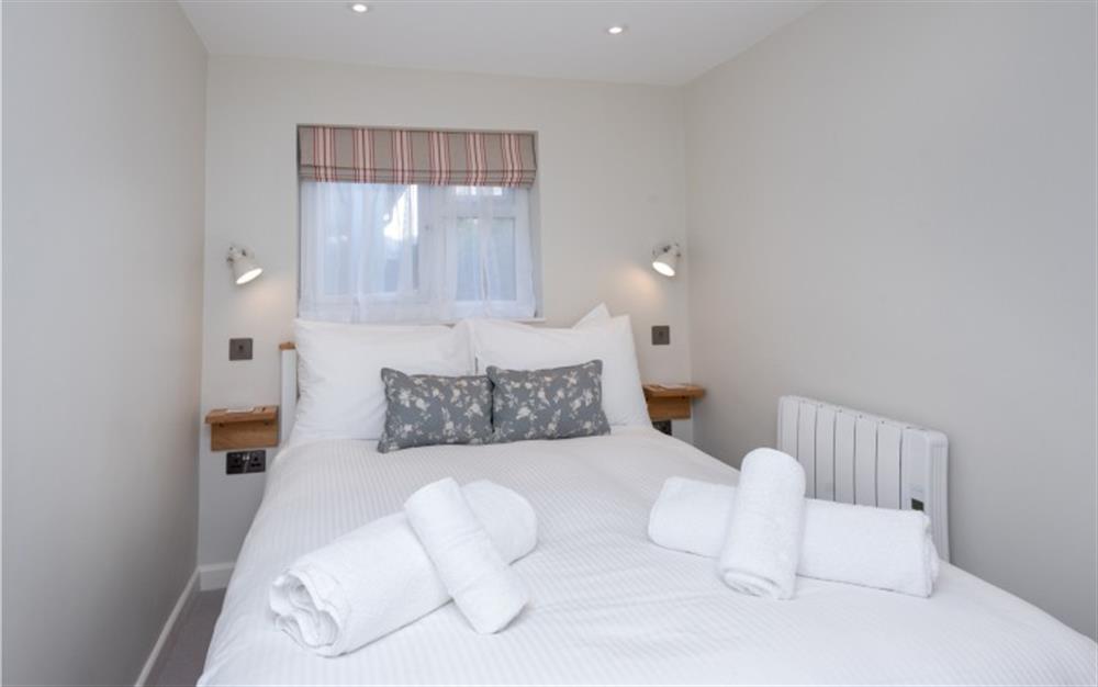 Currently with a double bed, this room will change to a single bed with a trundle. at Anchors Aweigh in Helford Passage