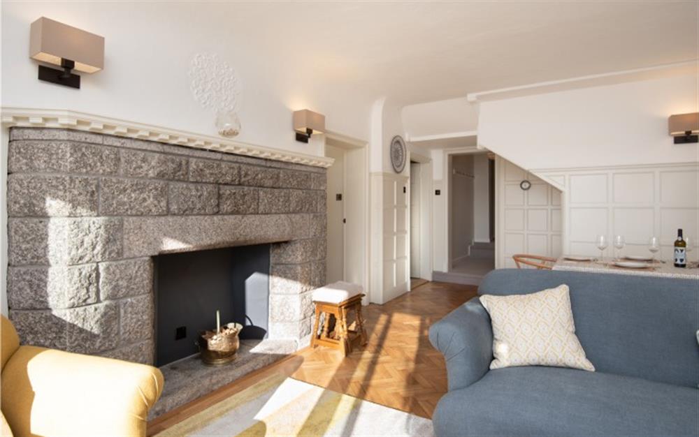 Such a bright, sunny space, and I love the original feature fireplace.