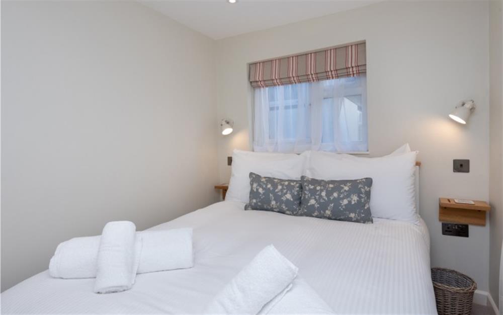 The third bedroom has a double bed and wardrobe. at Anchors Aweigh in Helford Passage
