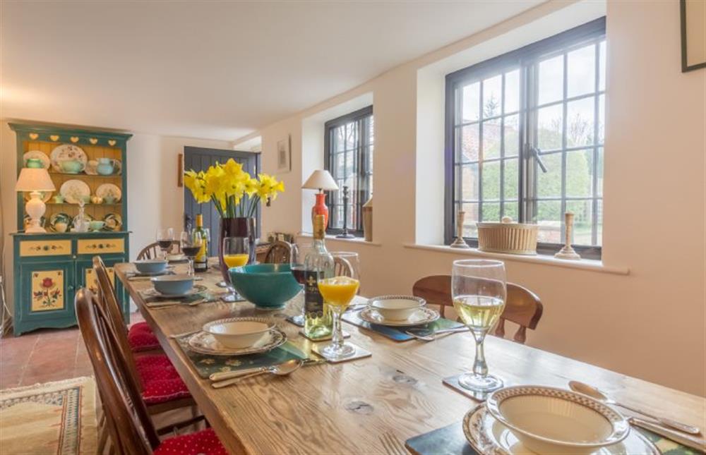 Ground floor: Dining room with access to rear garden at Angel Cottage, Great Walsingham