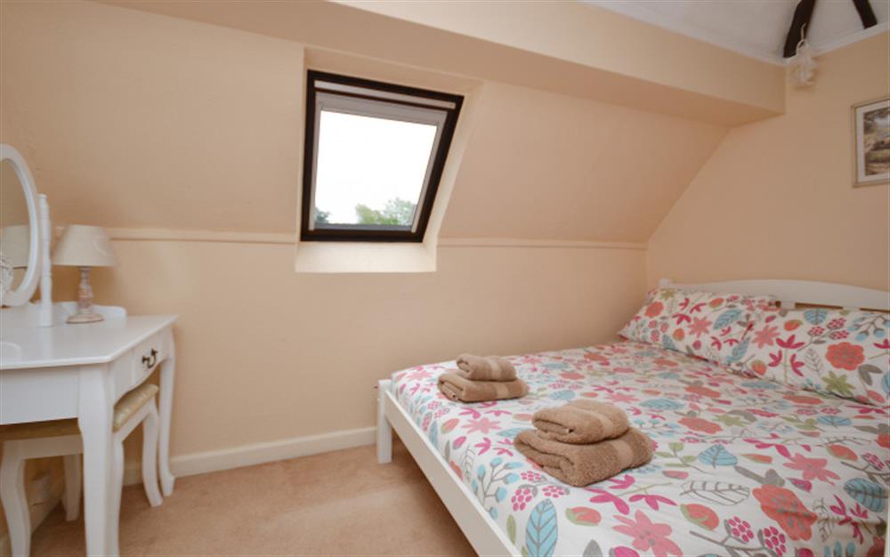 One of the 4 bedrooms (photo 2) at Angel Valley Cottage in Brockenhurst