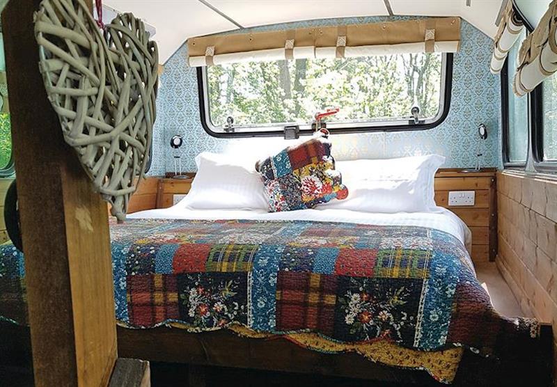 The bedroom in the Glamping Bus at Angrove Country Park in Great Ayton, Yorkshire Moors and Coast