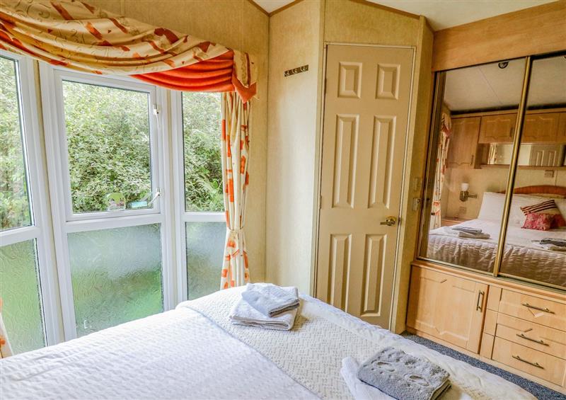 One of the bedrooms at Animal Sanctuary Caravan Stay, Tegryn near Crymych