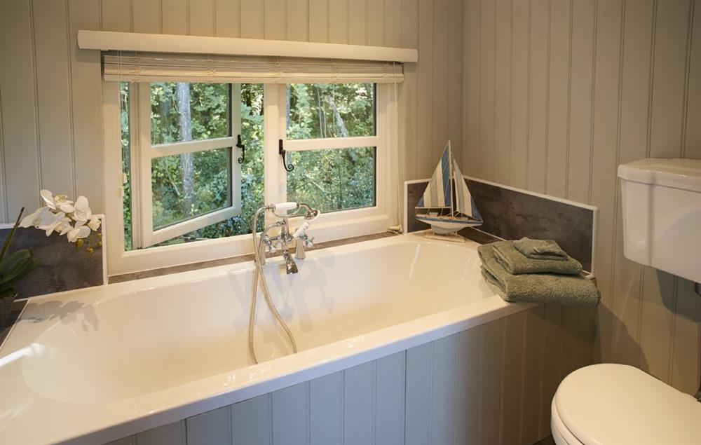 The bathing and dressing hut with double ended bath and walk in shower  (photo 3) at Annes Hut, Penterry