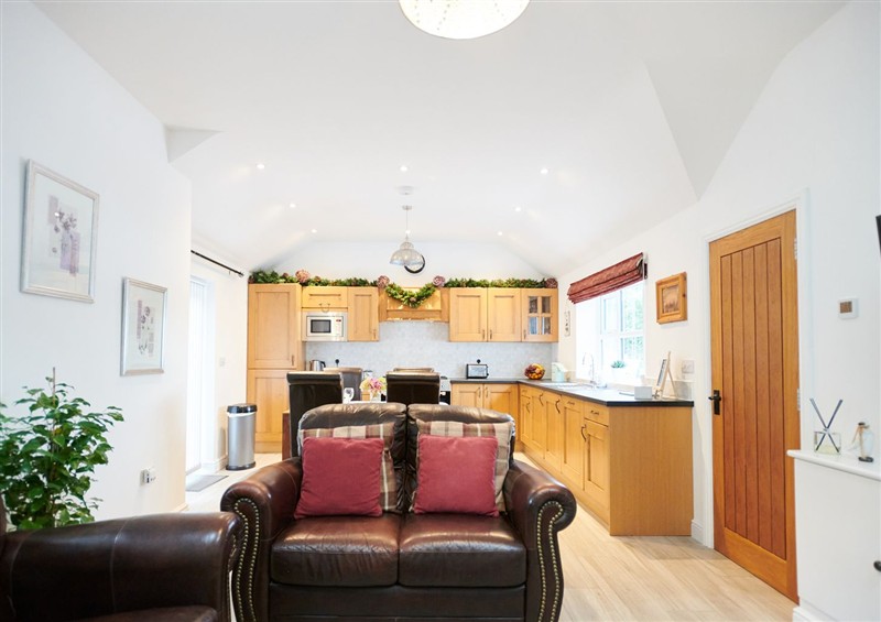 This is the living room at Annexe at Ty Moel Isaf, Pengorffwysfa near Amlwch