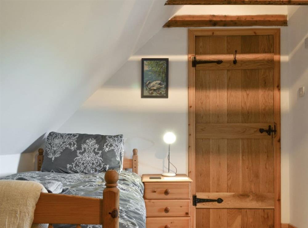 Good sized twin bedroom at Annies Cottage in Edinbane, near Portree, Isle Of Skye