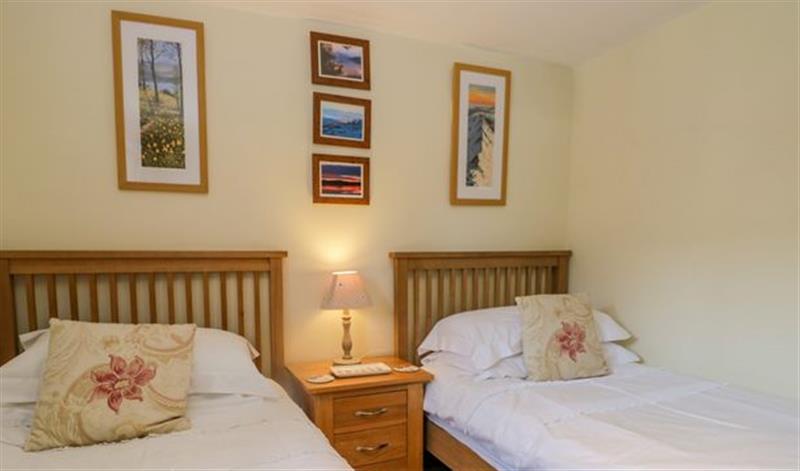 This is a bedroom (photo 3) at Anniversary Cottage, Ambleside
