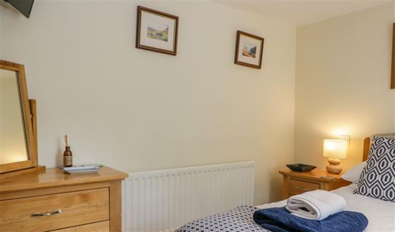 This is a bedroom at Anniversary Cottage, Ambleside