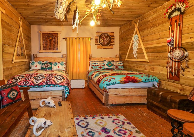 This is a bedroom at Apache Falls Lodge, Castlerock