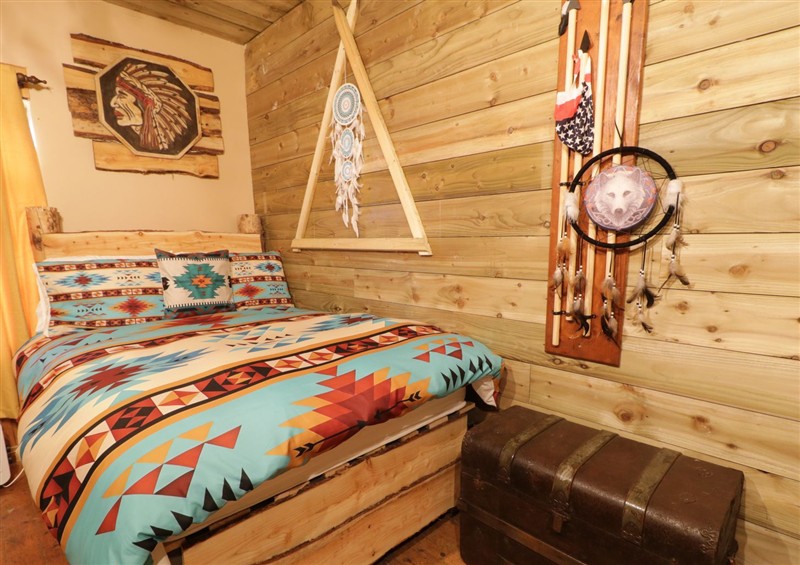This is the bedroom (photo 3) at Apache Falls Lodge, Castlerock