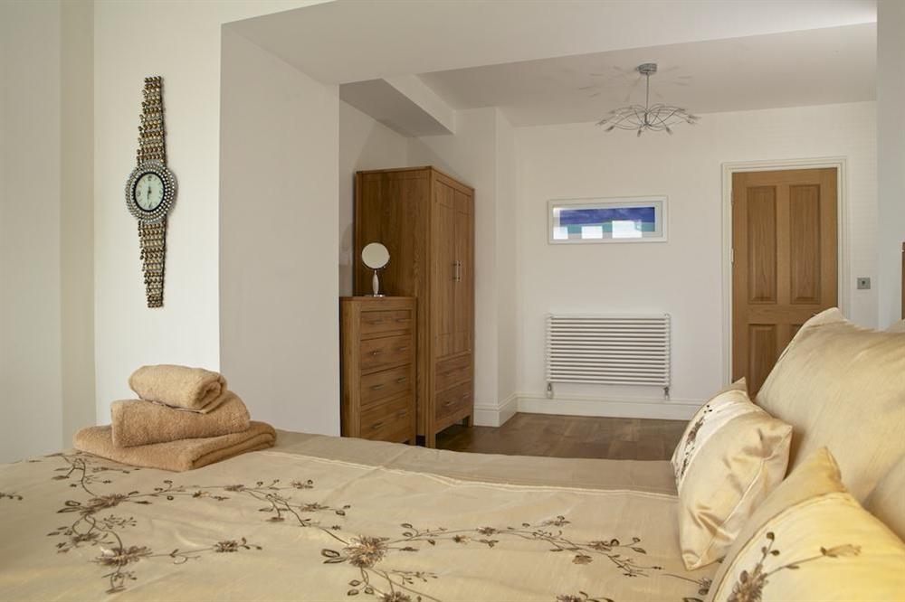 Double bedroom with King-size bed and views (photo 2) at Apartment 1, At The Beach in Torcross, Nr Kingsbridge