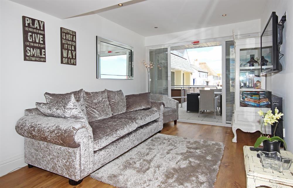 Lovely sitting area with stylish sofa at Apartment 1, At The Beach in Torcross, Nr Kingsbridge