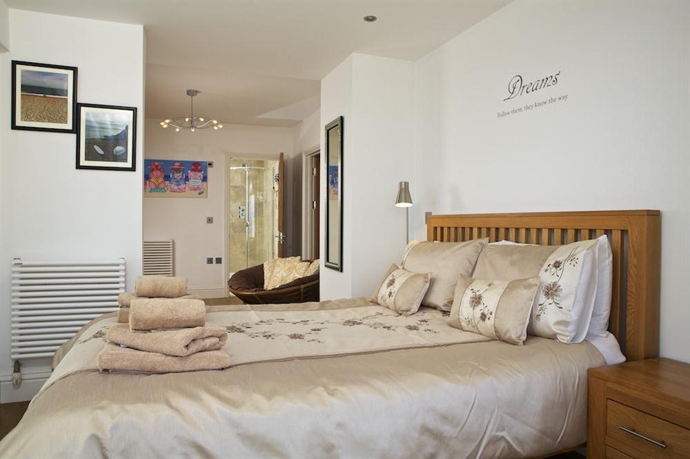 Master bedroom with King-size bed and stunning views at Apartment 1, At The Beach in Torcross, Nr Kingsbridge