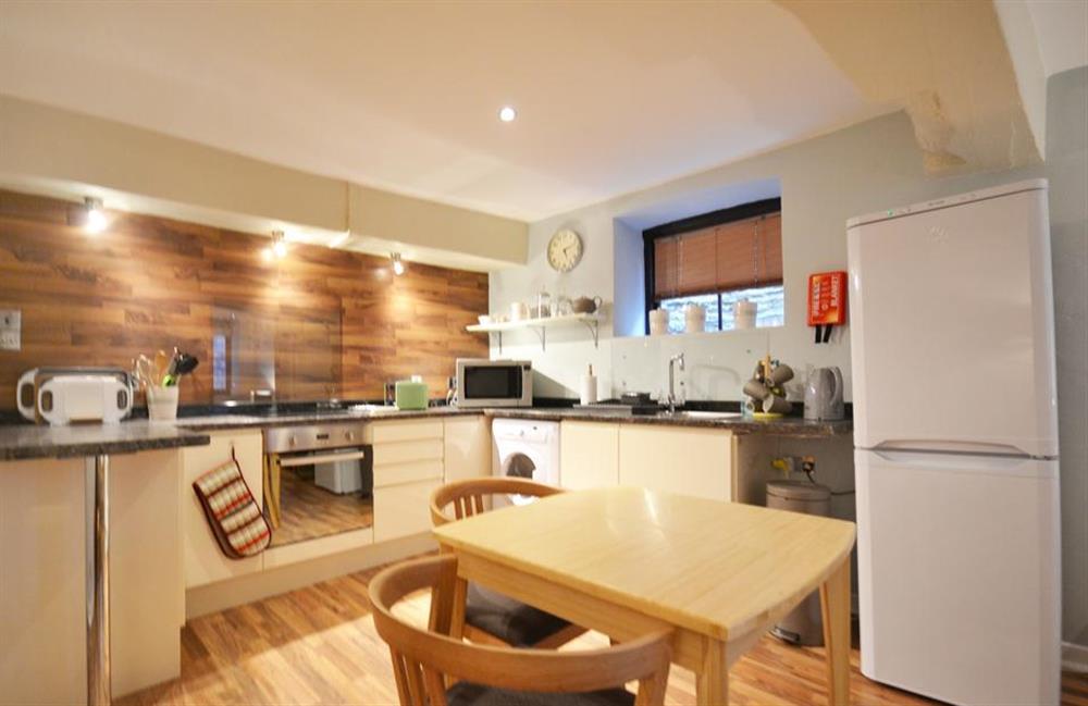 The modern kitchen and dining area at Apartment 1, Buller House, Looe