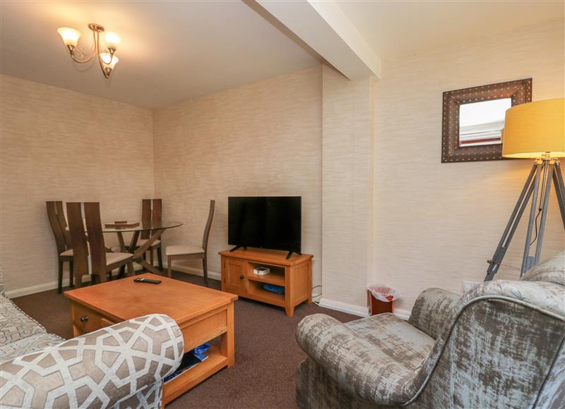 Relax in the living area at Apartment 1, Keswick