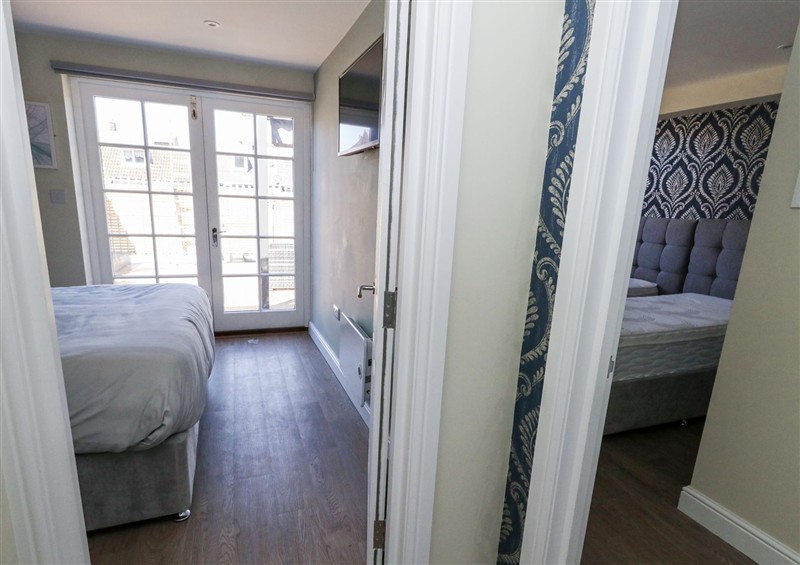A bedroom in Apartment 1 at Apartment 1, Weymouth