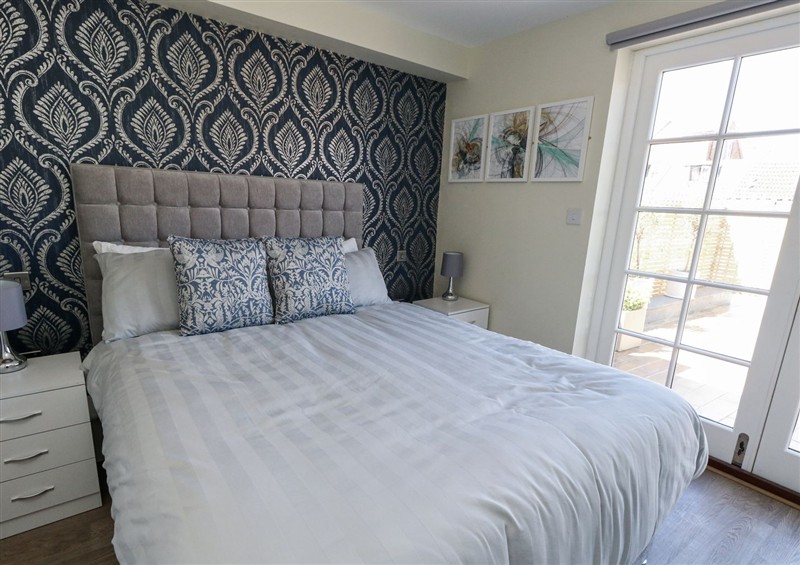 One of the bedrooms at Apartment 1, Weymouth